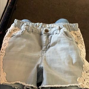 Light wash embroidered shorts
